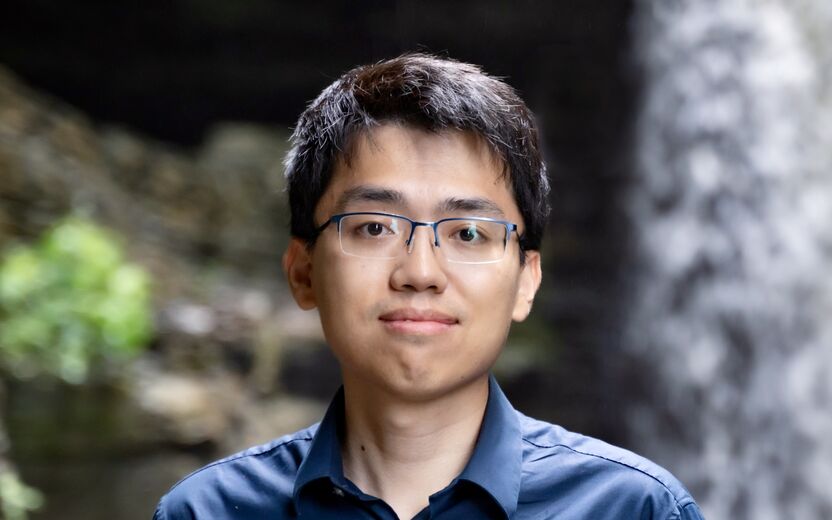 Physicist Xiaomeng Liu faces the camera 