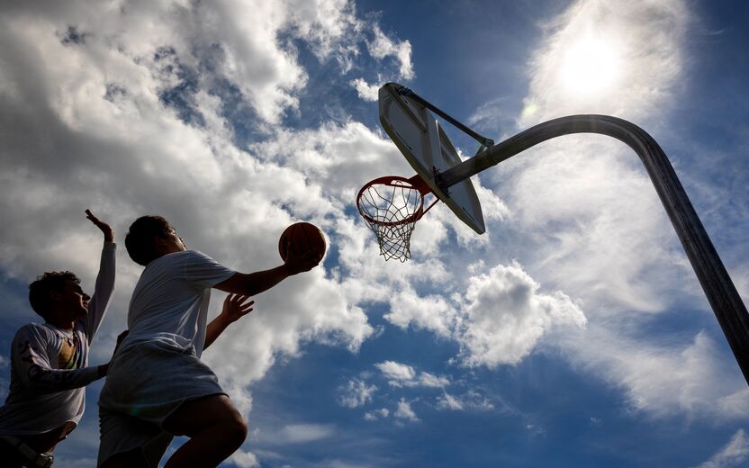 image of silhouetted basketball players